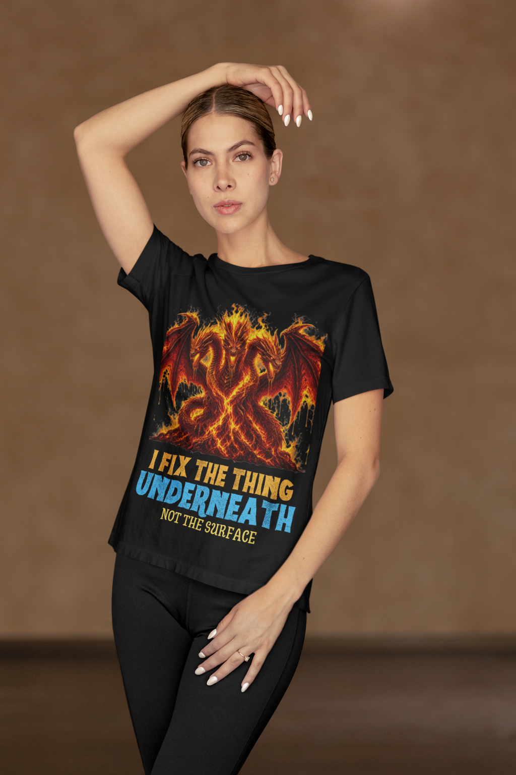 I Fix The Thing Underneath - Woman in Black tee activewear pose