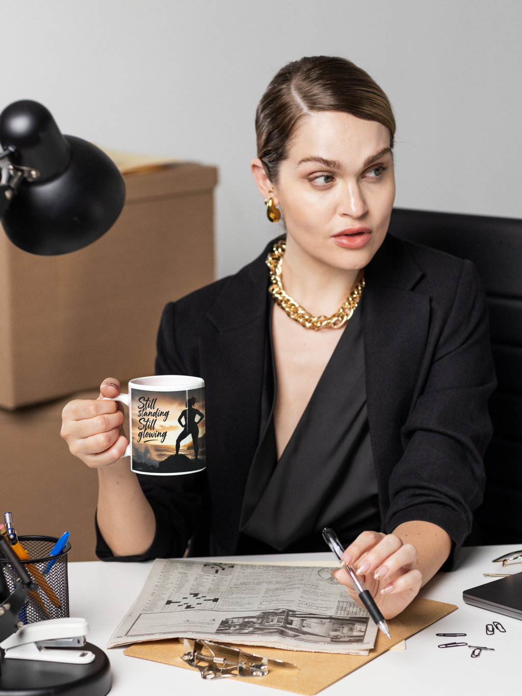 Still Standing Still Glowing - White mug held by woman working in office