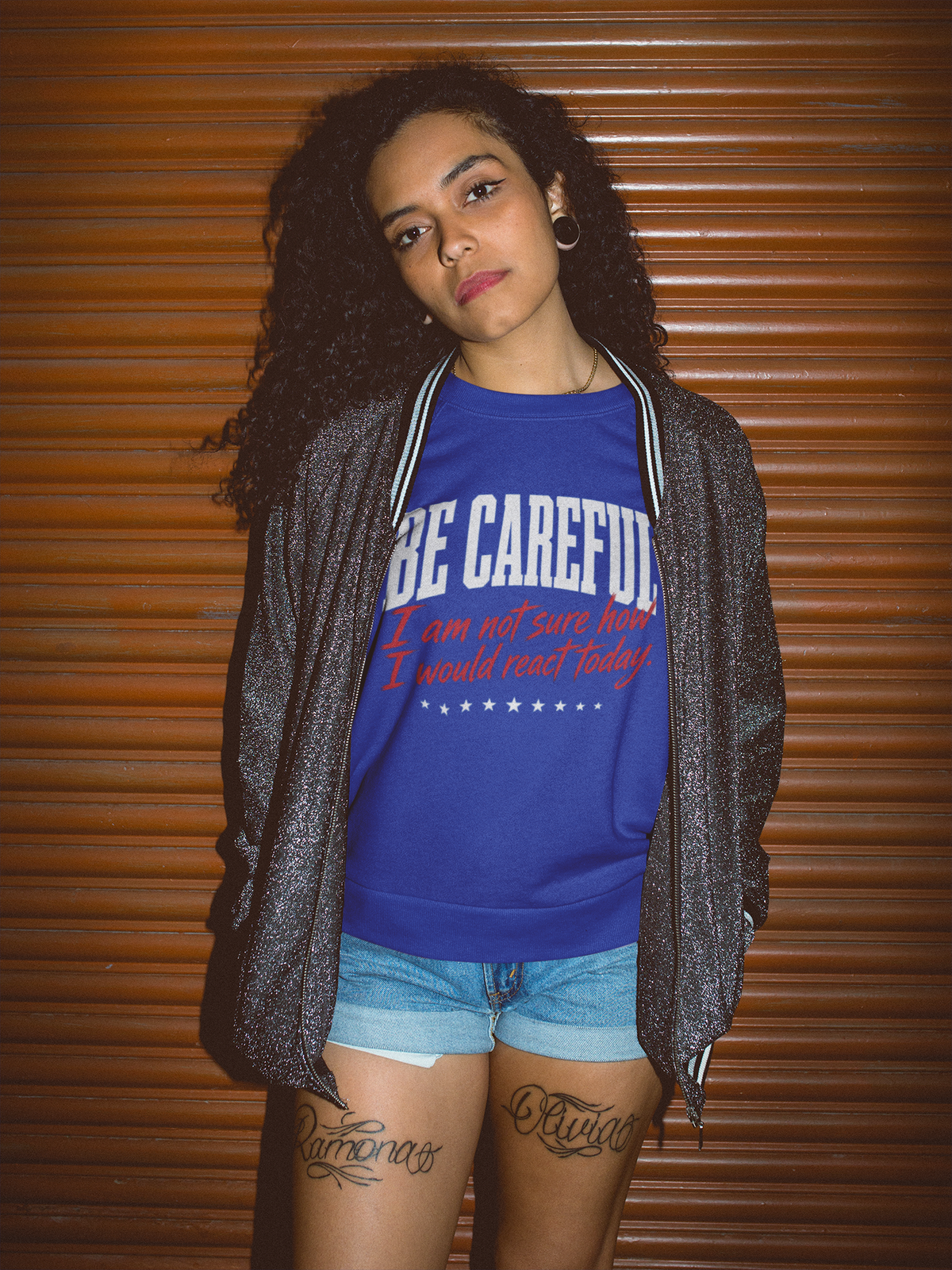 Be Careful blue tee worn by model