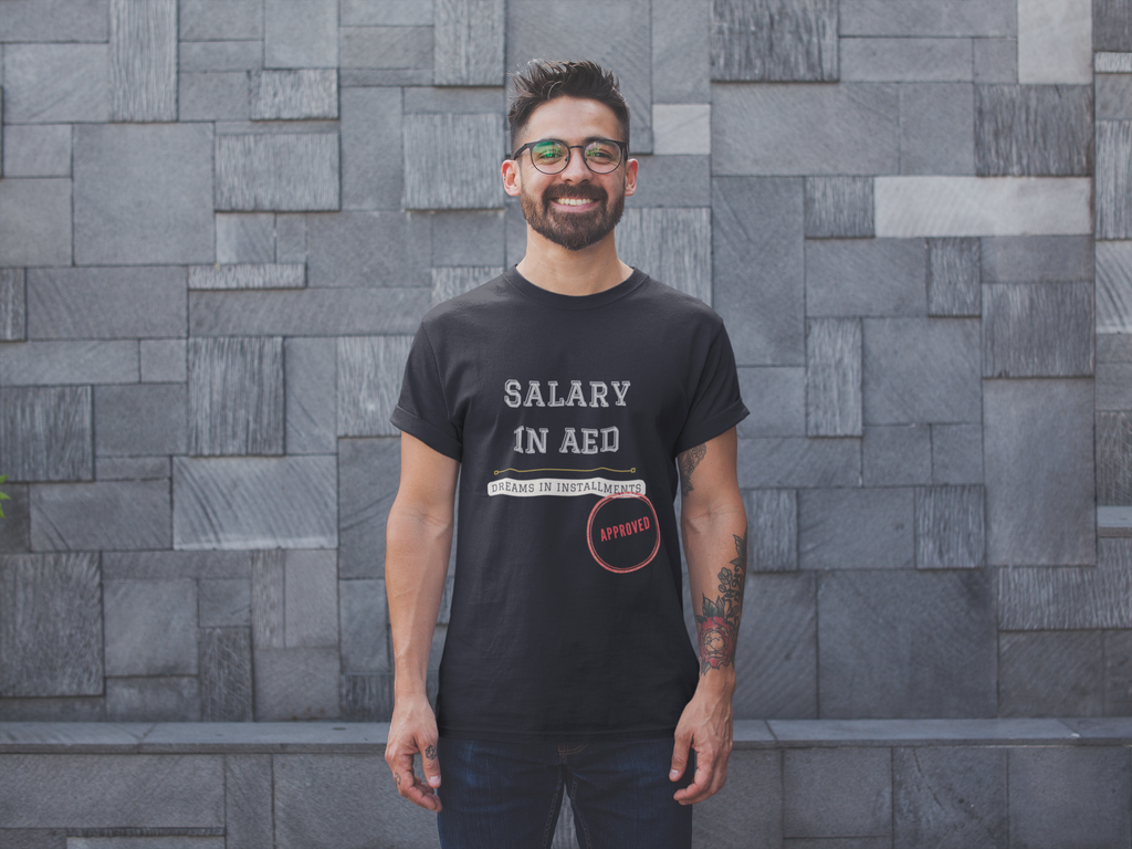 Salary in AED Dreams in Installments black men's tee smiling man with glasses