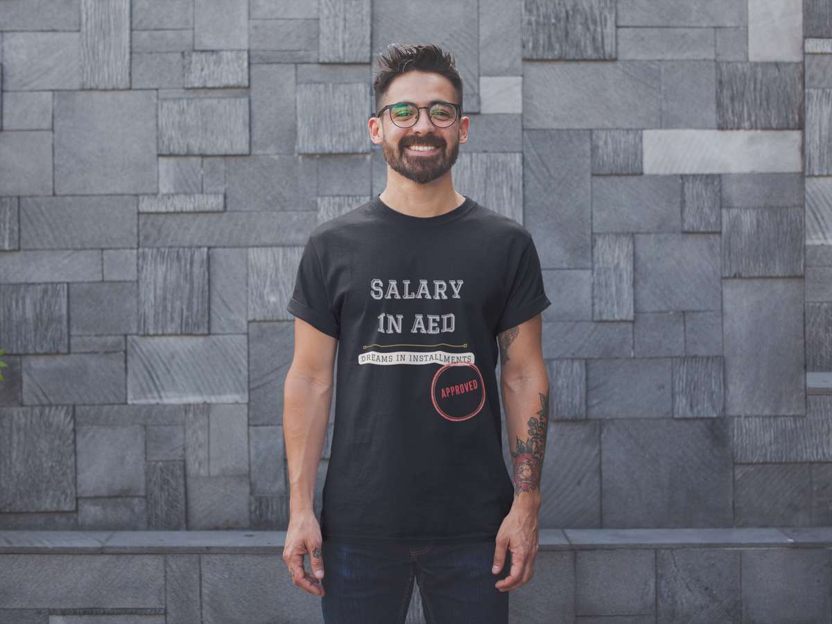 Salary in AED Dreams in Installments black men's tee smiling man with glasses