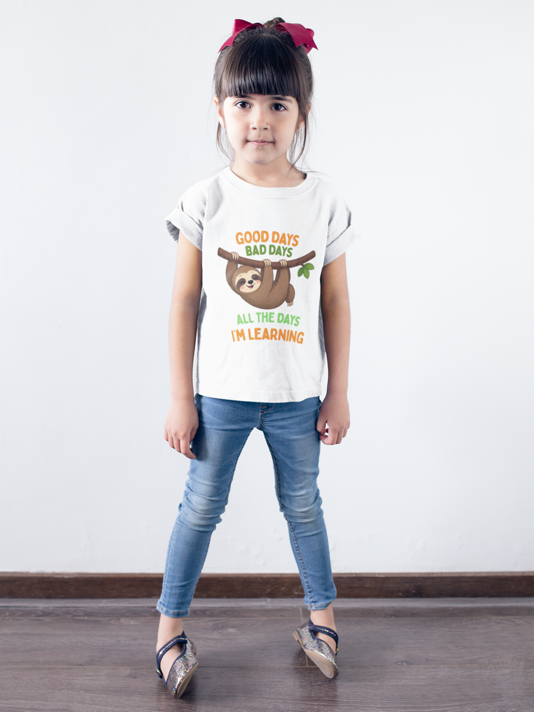 Mini Learning Sloth Tee White - little girl against white wall