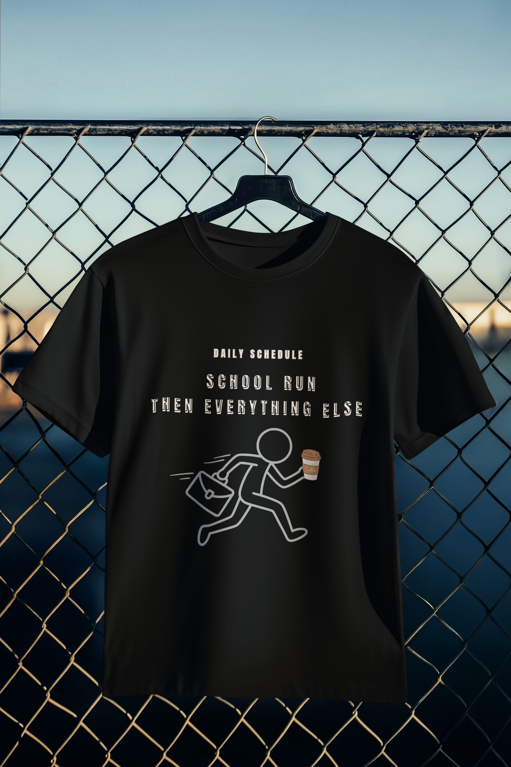 School Run Then Everything Else black tee hanging on wire fence