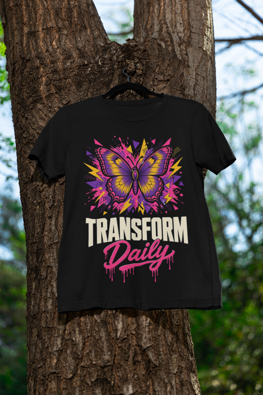 Transform Daily tee - Black, hanging on tree hanger