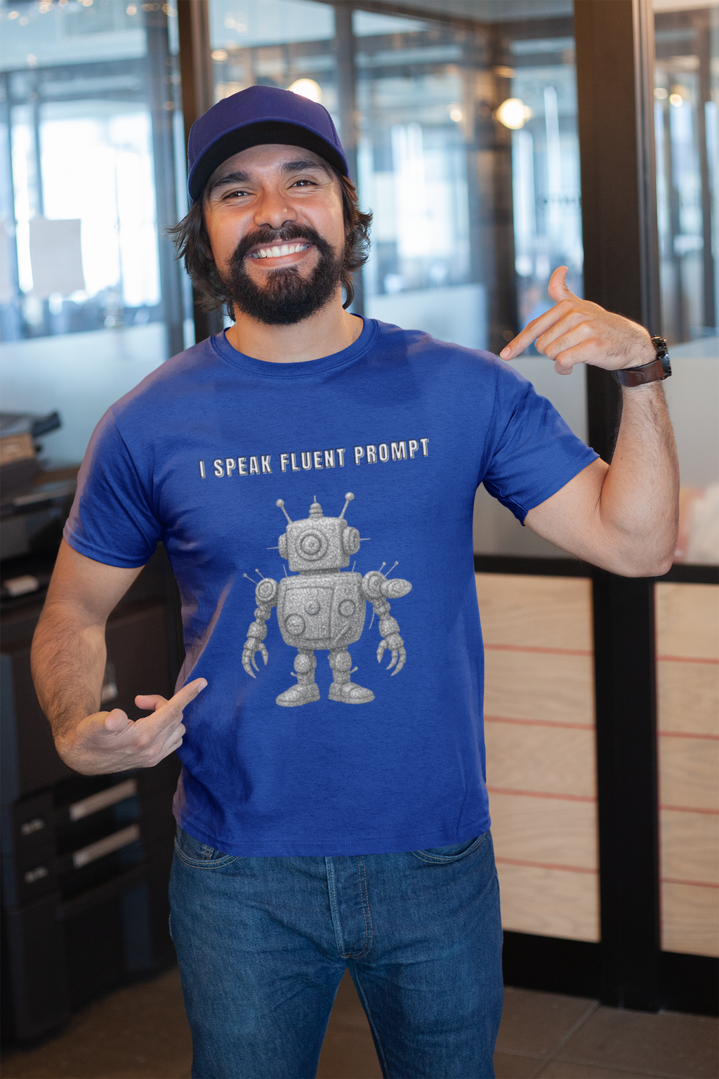 Man wearing the blue I Speak Fluent Prompt robot T-shirt.