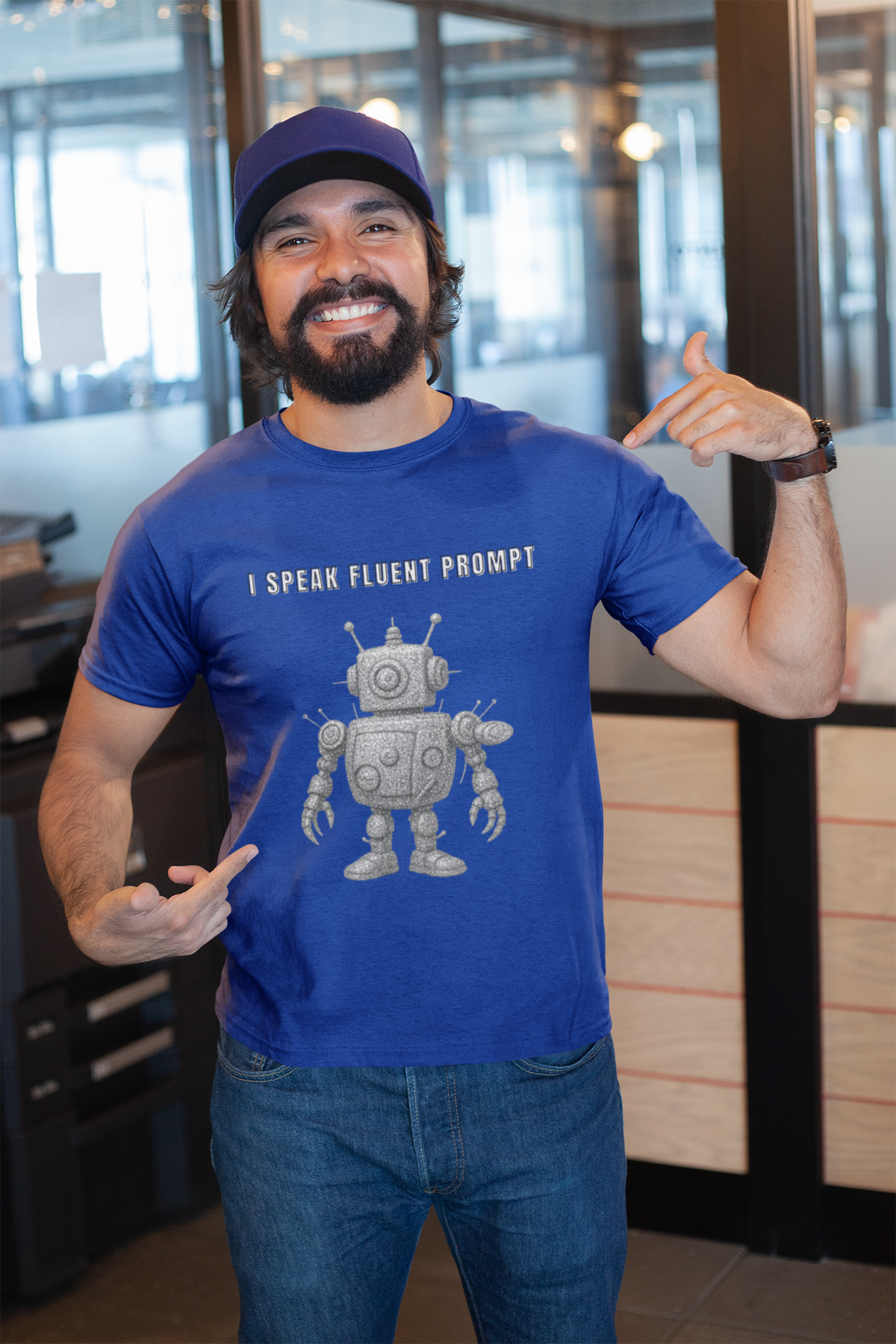Man wearing the blue I Speak Fluent Prompt robot T-shirt.