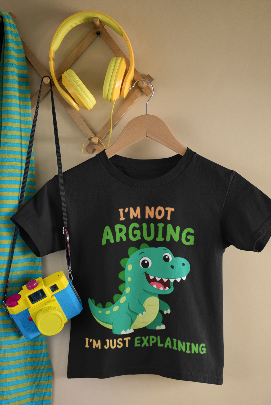 Mini Lawyer Dino T-Shirt Black - hanging with camera and headphones