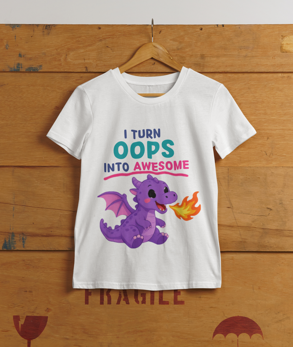 Mini Dragon Power Tee Black - hanging on cargo box