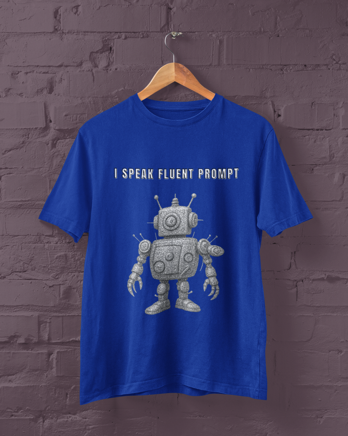 Blue men's T-shirt on a hanger with a robot graphic and I Speak Fluent Prompt lettering.