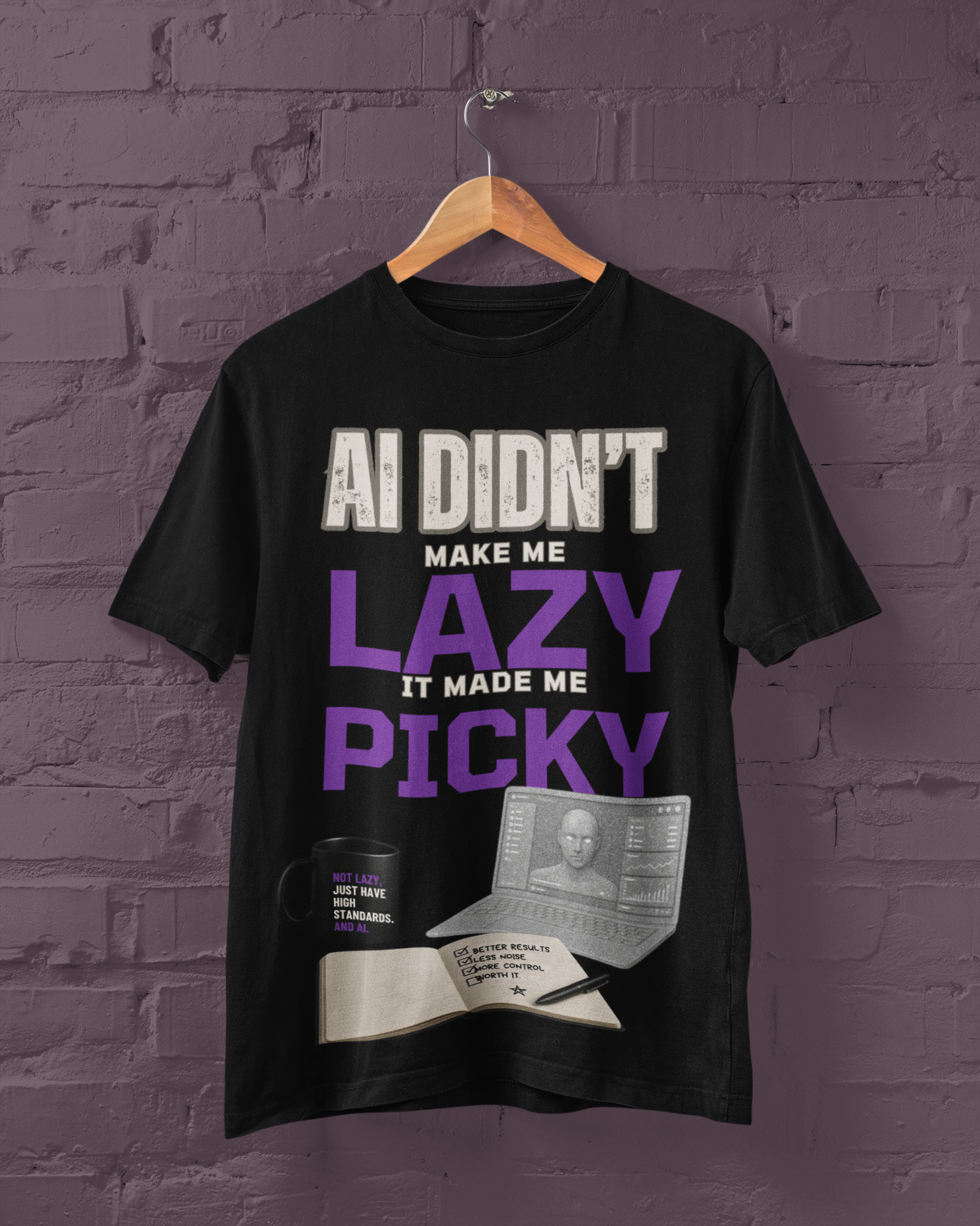 Black T-shirt on a hanger with AI Didn't Make Me Lazy, It Made Me Picky graphic and desk illustration.