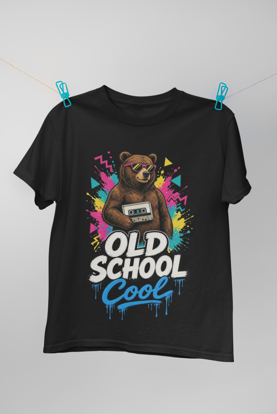 Old School Cool tee - Black, hanging on clothesline