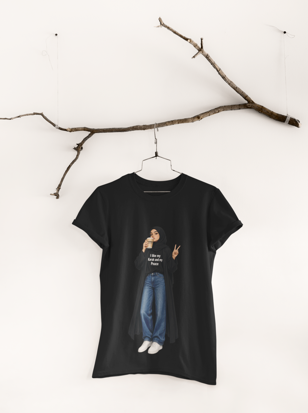 My Karak My Peace Tee Black - hanging from ornamental branch