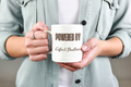 Powered by Coffee & Deadlines Mug - woman holding white ceramic mug