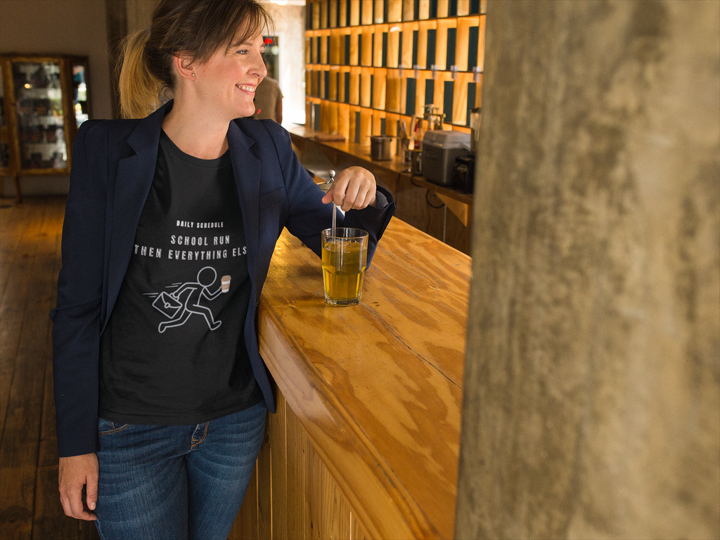 School Run Then Everything Else navy tee woman smiling at bar