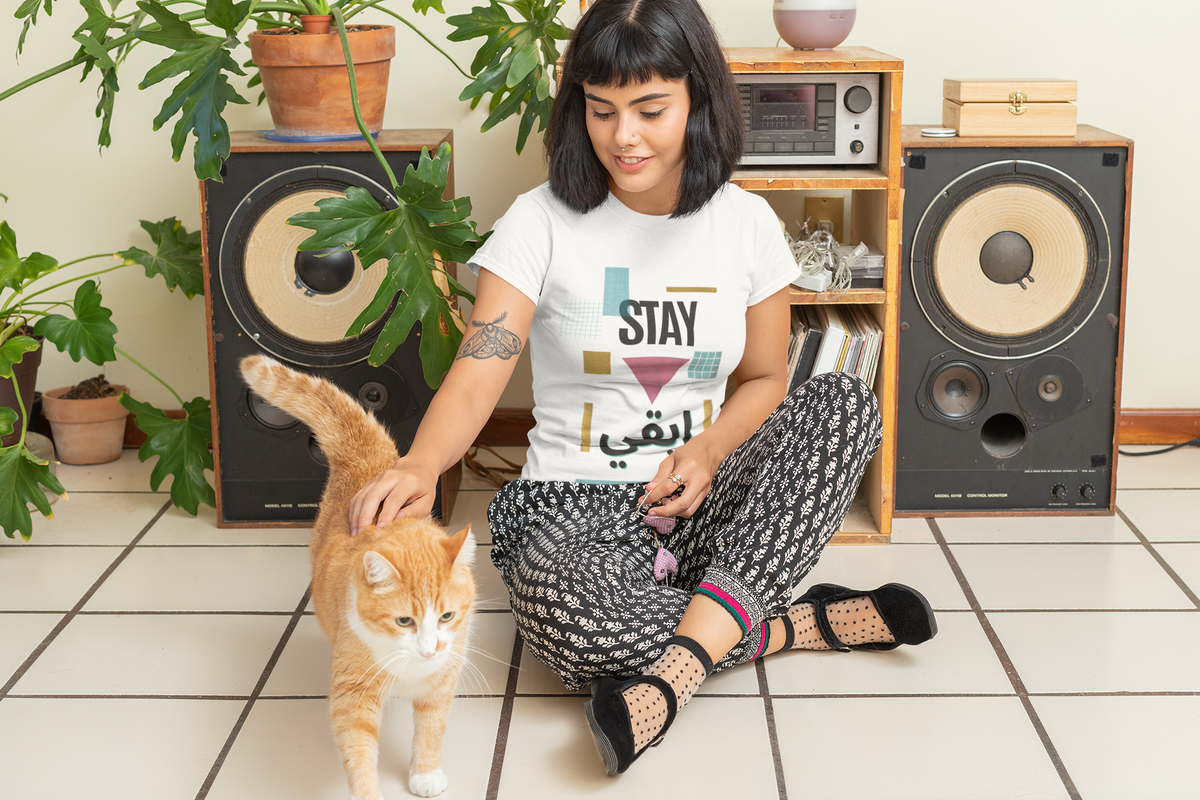 Stay ابقي Geometry Tee – White women wear mockup with cat