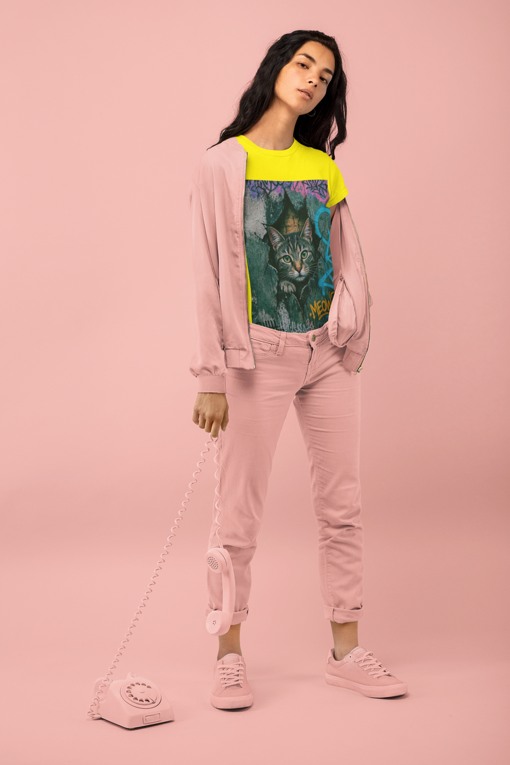 Graffiti Meow Tee Yellow - woman holding vintage telephone at studio