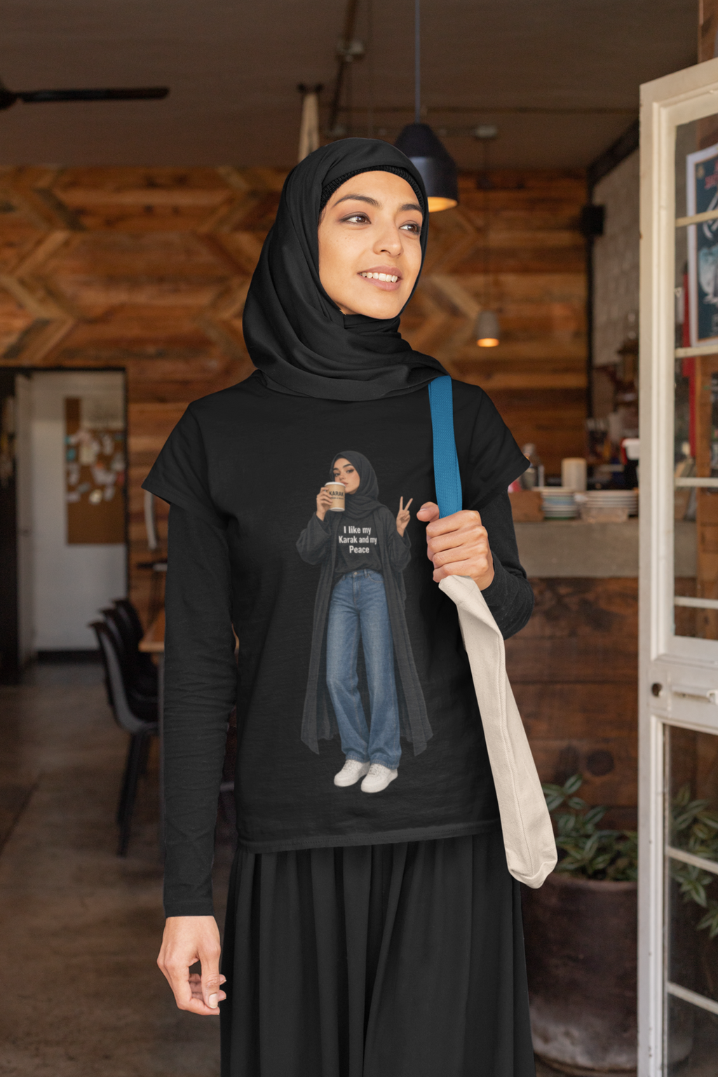 My Karak My Peace Tee Black - woman with hijab holding purse