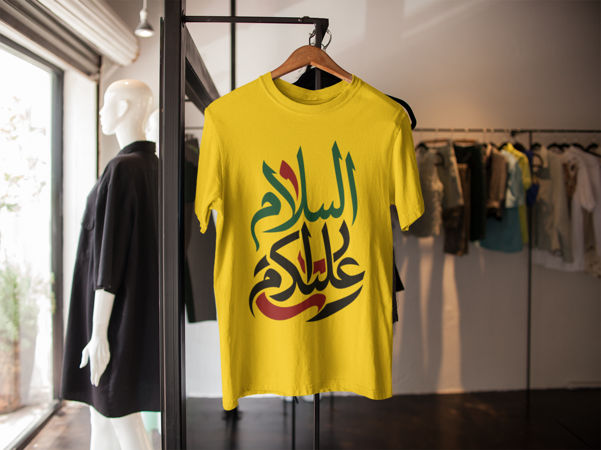 السلام عليكم tee - Yellow, hanger in clothes store